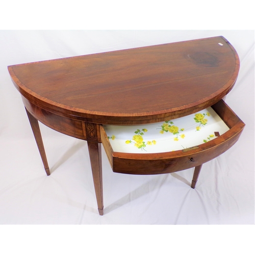 125 - Georgian inlaid and crossbanded mahogany
demi-lune card table with fold-over top, gateleg support, i... 