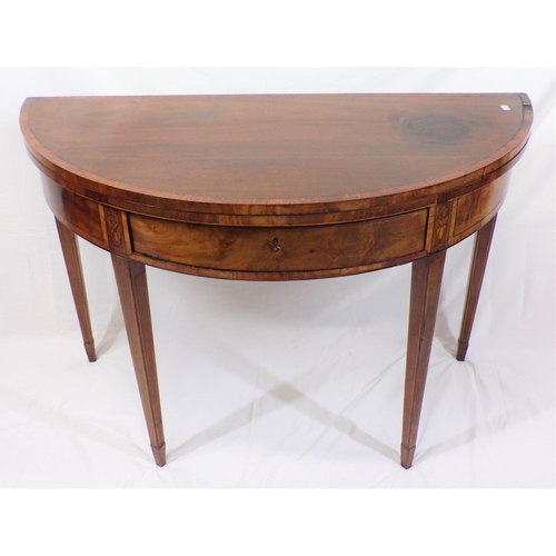 125 - Georgian inlaid and crossbanded mahogany
demi-lune card table with fold-over top, gateleg support, i... 