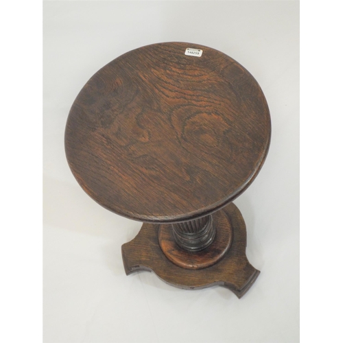 149 - Regency style oak round table or stand with reeded column on shaped base