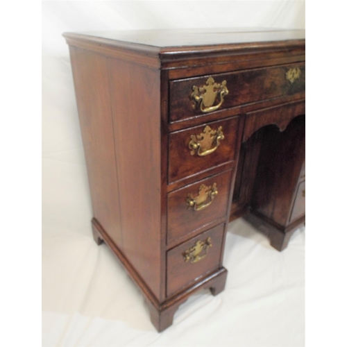 160 - Georgian mahogany knee-hole desk with frieze drawer, napery drawer, six pedestal drawers, all with b... 