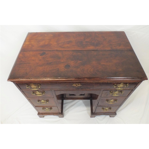 160 - Georgian mahogany knee-hole desk with frieze drawer, napery drawer, six pedestal drawers, all with b... 