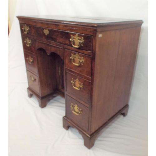 160 - Georgian mahogany knee-hole desk with frieze drawer, napery drawer, six pedestal drawers, all with b... 