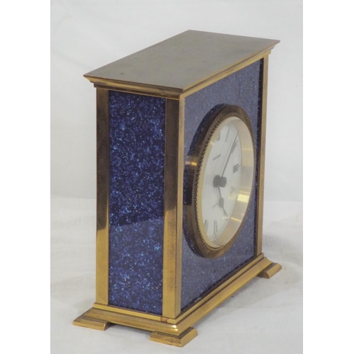 174 - Brass cased clock with brass framed enamel dial on bracket