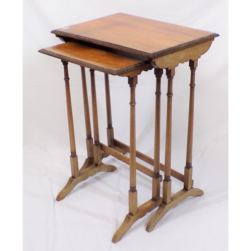 176 - Nest of 2 Edwardian mahogany tables with turned tapering columns, cross stretchers and bracket feet