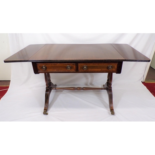 180 - Edwardian style mahogany sofa table with reeded borders, drop leaves with pull-out supports, 2 friez... 