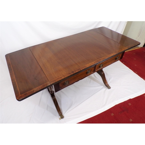 180 - Edwardian style mahogany sofa table with reeded borders, drop leaves with pull-out supports, 2 friez... 