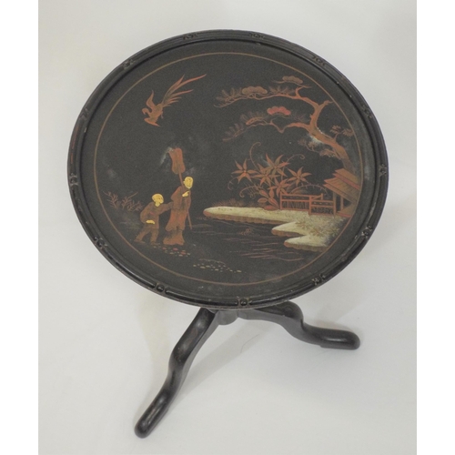 183 - Oriental round ebonised lamp or wine table with scenic decoration