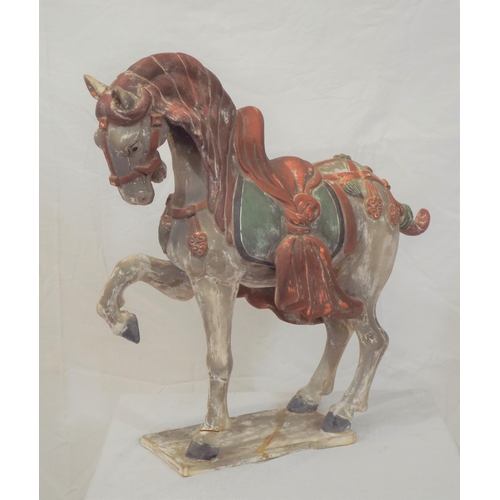 189 - Ornate terracotta figure of a horse on oblong stand