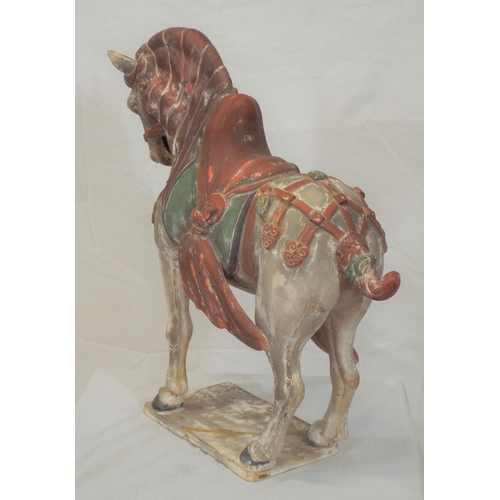 189 - Ornate terracotta figure of a horse on oblong stand