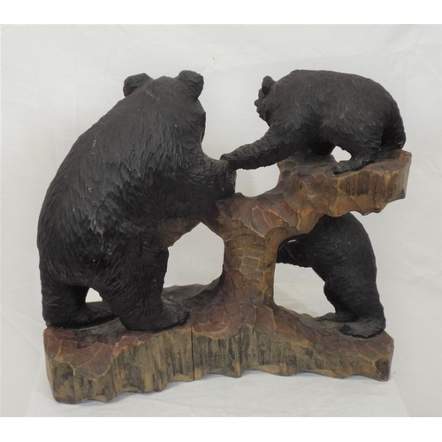 192 - Austrian carved timber group of bears with fish, on shaped base