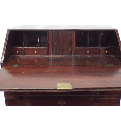 205 - Georgian inlaid walnut bureau with drop-down front, pullout supports, fitted interior, four drawers ... 