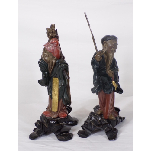 227 - Pair of Asian figures of gentlemen, on shaped bases