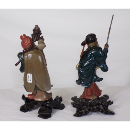 227 - Pair of Asian figures of gentlemen, on shaped bases