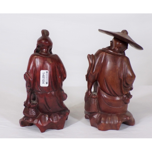 228 - Pair of Asian figures of gentlemen, on shaped bases