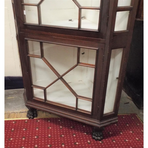 252 - Georgian style mahogany corner display cabinet with scroll top, astragal glazed doors, on lion claw ... 