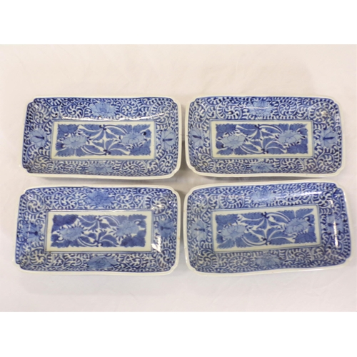 261 - Set of 4 Asian oblong dishes with blue and white foliate decoration