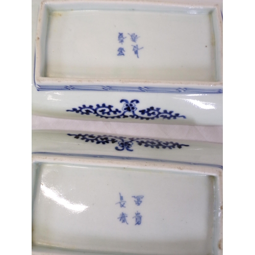 261 - Set of 4 Asian oblong dishes with blue and white foliate decoration