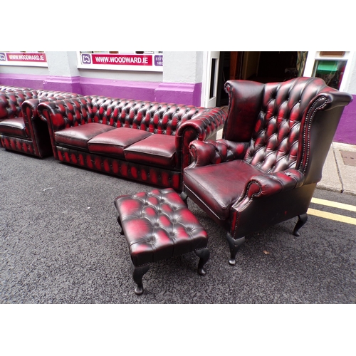 350 - 7 piece lounge suite with red leather button back upholstery, brass pins, 2 wingback armchairs, 3 se... 