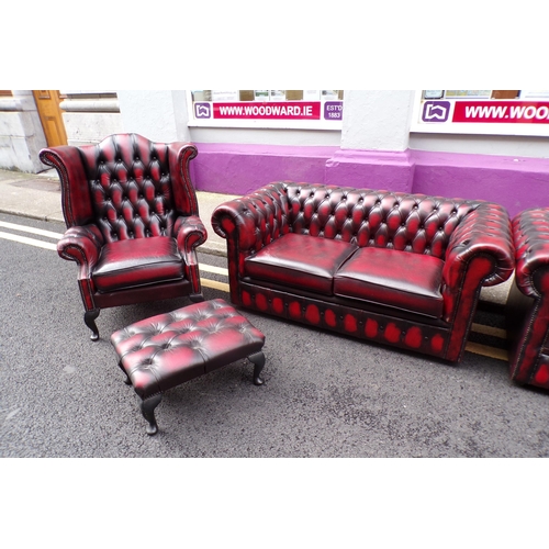 350 - 7 piece lounge suite with red leather button back upholstery, brass pins, 2 wingback armchairs, 3 se... 