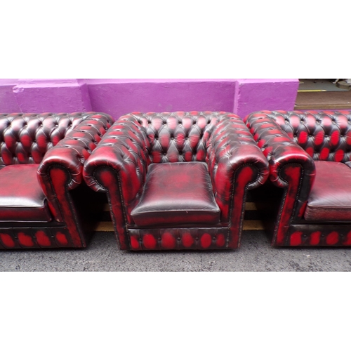 350 - 7 piece lounge suite with red leather button back upholstery, brass pins, 2 wingback armchairs, 3 se... 