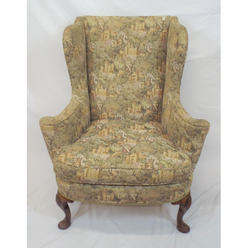 353 - Georgian wingback armchair with heraldic upholstery, on cabriole legs with shell knees and pad feet