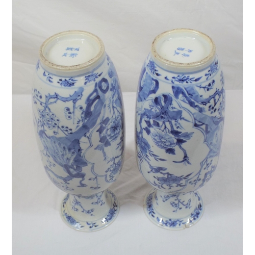 43 - Pair of Asian baluster shaped flower vases with blue and white foliate and bird decoration