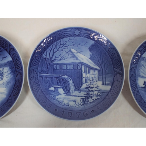 47 - Set of three circular Royal Copenhagen plaques decorated with winter scenes