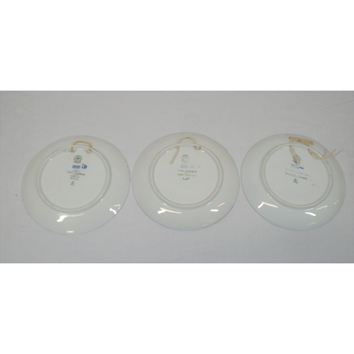 47 - Set of three circular Royal Copenhagen plaques decorated with winter scenes