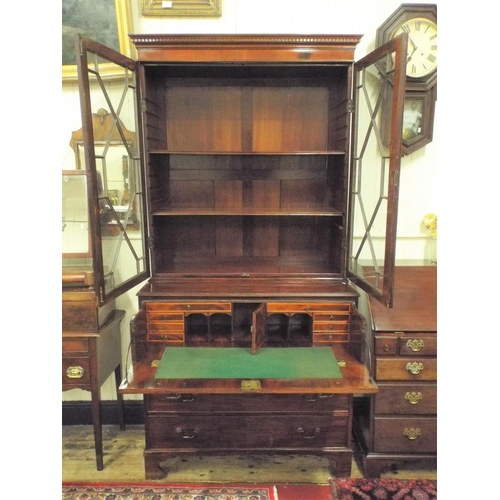 55 - Edwardian inlaid and crossbanded mahogany bureau bookcase with dentil frieze, astragal glazed door, ... 