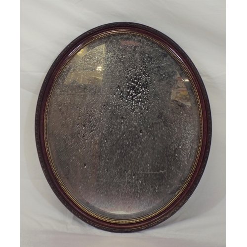 73 - Regency style oval bevelled wall mirror with beaded decoration