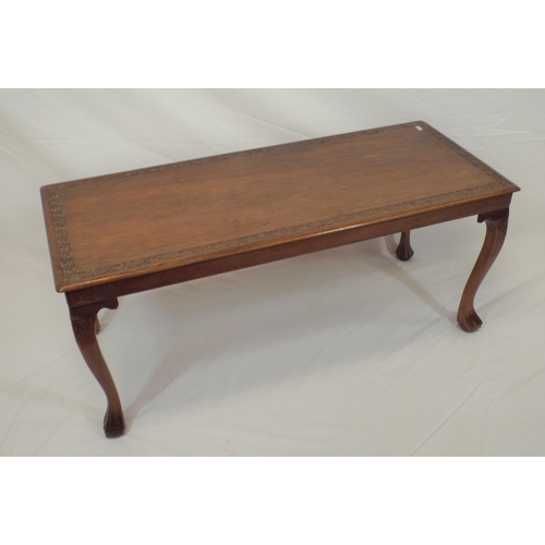 79 - Edwardian mahogany oblong occasional or coffee table with foliate decorated border, on cabriole legs