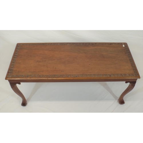 79 - Edwardian mahogany oblong occasional or coffee table with foliate decorated border, on cabriole legs