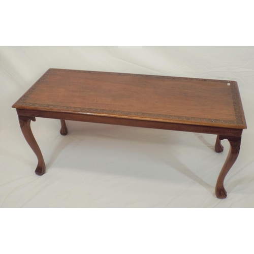 79 - Edwardian mahogany oblong occasional or coffee table with foliate decorated border, on cabriole legs