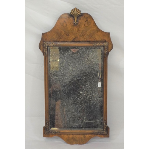 82 - Queen Anne walnut framed pier glass mirror with bevelled glass inset, shell decoration and shaped to... 