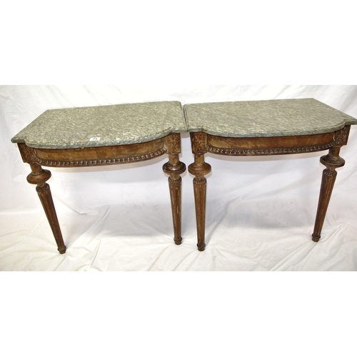 95 - Pair of Regency style bedside tables with shaped marble tops, on reeded tapering legs. Wall attached