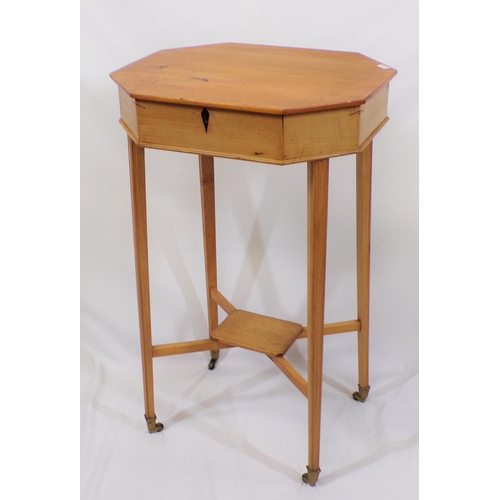 96 - Edwardian yew work table with hexagonal shaped lift-up lid, the interior fitted with presses with li... 