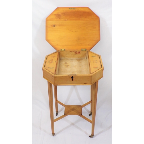 96 - Edwardian yew work table with hexagonal shaped lift-up lid, the interior fitted with presses with li... 