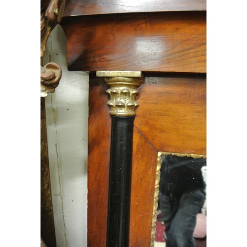 251 - Empire style mahogany and ebonised framed console mirror with curved top and columns