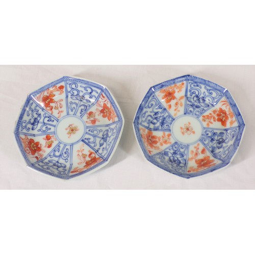 265 - Pair of Asian small bowls of hexagonal form with blue and ochre decoration