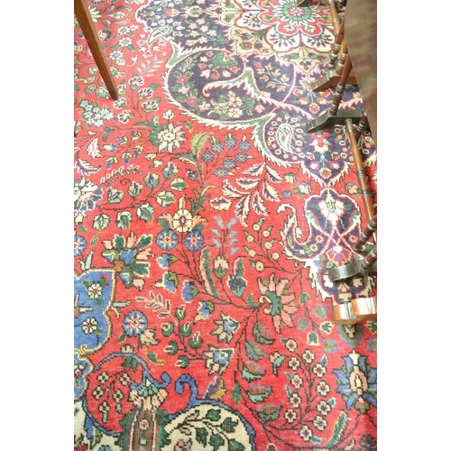 207 - Large multi coloured ground Persian Tabriz carpet with bespoke floral desing