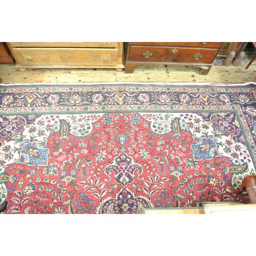 207 - Large multi coloured ground Persian Tabriz carpet with bespoke floral desing