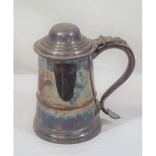 10 - Silverplated tankard of round tapering form with domed lid and shaped handle