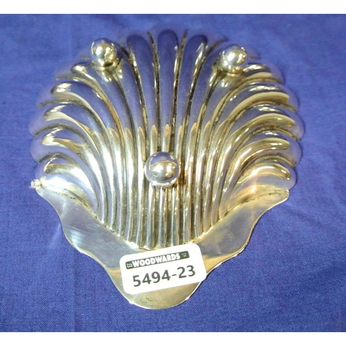 126 - Victorian Sheffield silver shell-shaped bon bon dish with wavy border, crested, on bun feet, dated 1... 