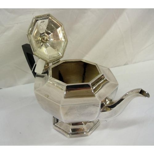 131 - Sheffield silver hexagonal shaped tea pot of bulbous panelled form, with shaped handle and spout, on... 