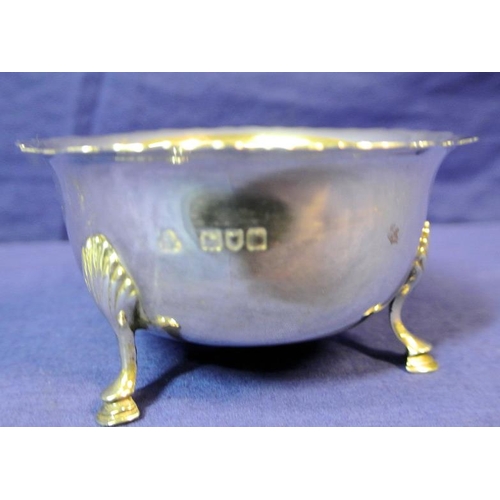 132 - London silver small sugar or sweetmeat bowl with wavy rim, shell knuckles and cast pad feet, dated 1... 