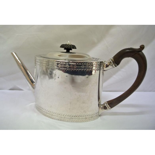 139 - George IV London silver teapot with embossed decoration, shaped handle and spout with lid, dated 182... 