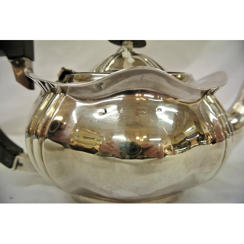 151 - Edward VII Birmingham silver oval teapot with wavy top and shaped corners, shaped handle and spout, ... 