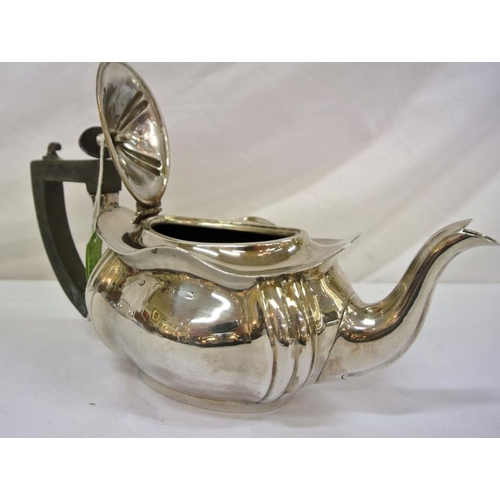 151 - Edward VII Birmingham silver oval teapot with wavy top and shaped corners, shaped handle and spout, ... 