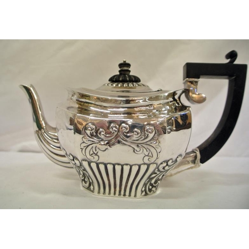 155 - Victorian Birmingham silver oval teapot of panelled form, with ornate ribbed and foliate decoration,... 