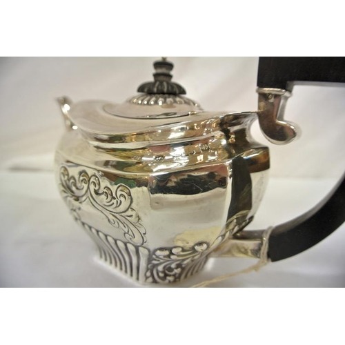 155 - Victorian Birmingham silver oval teapot of panelled form, with ornate ribbed and foliate decoration,... 